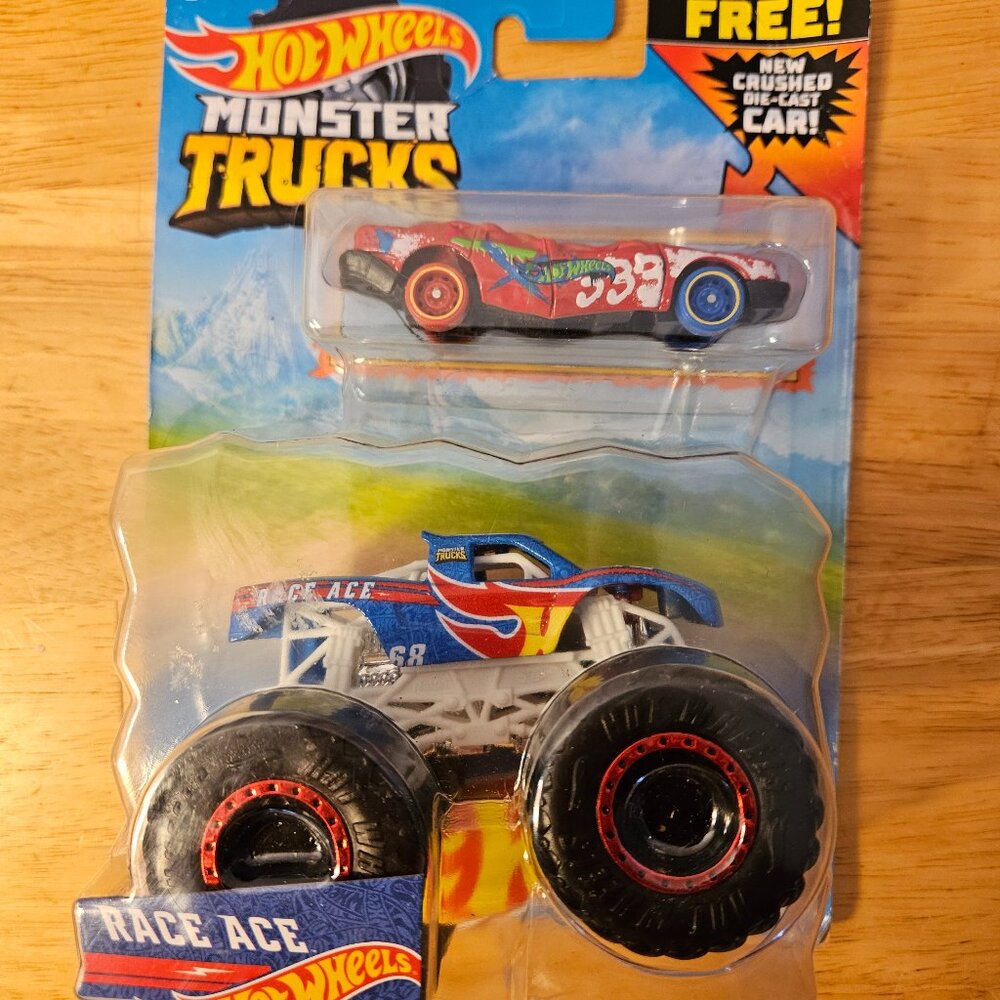 Hot Wheels Monster Trucks includes Free Crushed Diecast Car.  -- ITEM #1910